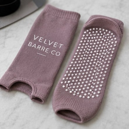 Custom grip socks for barre studios
