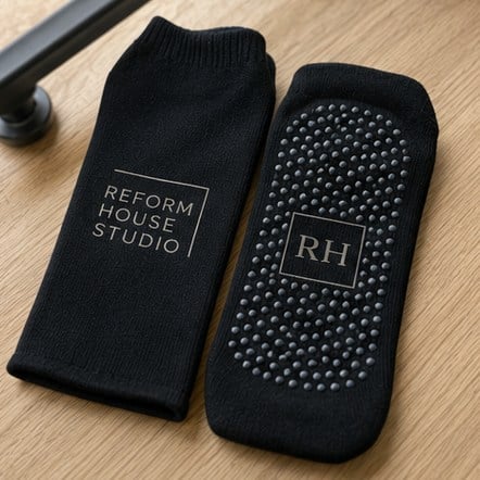 Custom grip socks for pilates and reformer studios